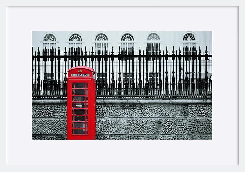 82853477 Red telephone box in street with historical architecture in London copy - ArtFramed